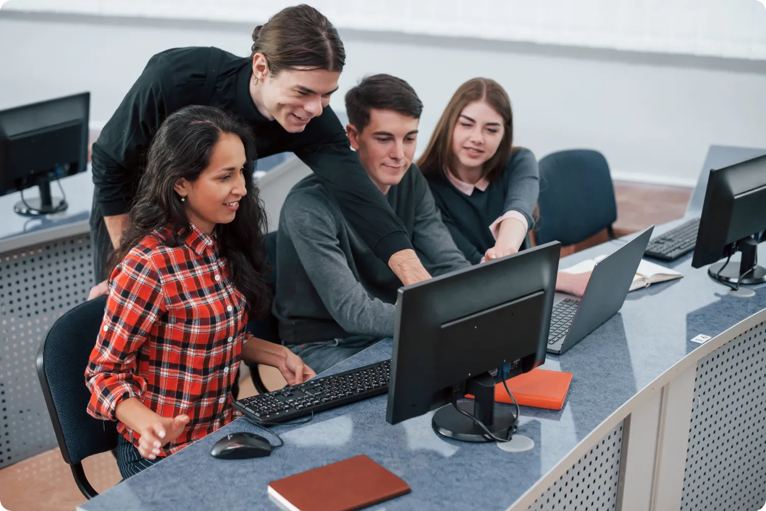 Students working on computers during guest lectures by industry engineers